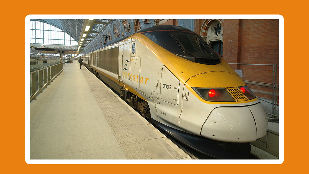 A picture of one of the Eurostar trains at station platform.