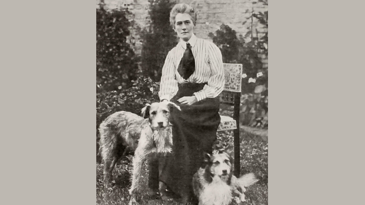 A photograph of World War One nurse Edith Cavell with her dogs