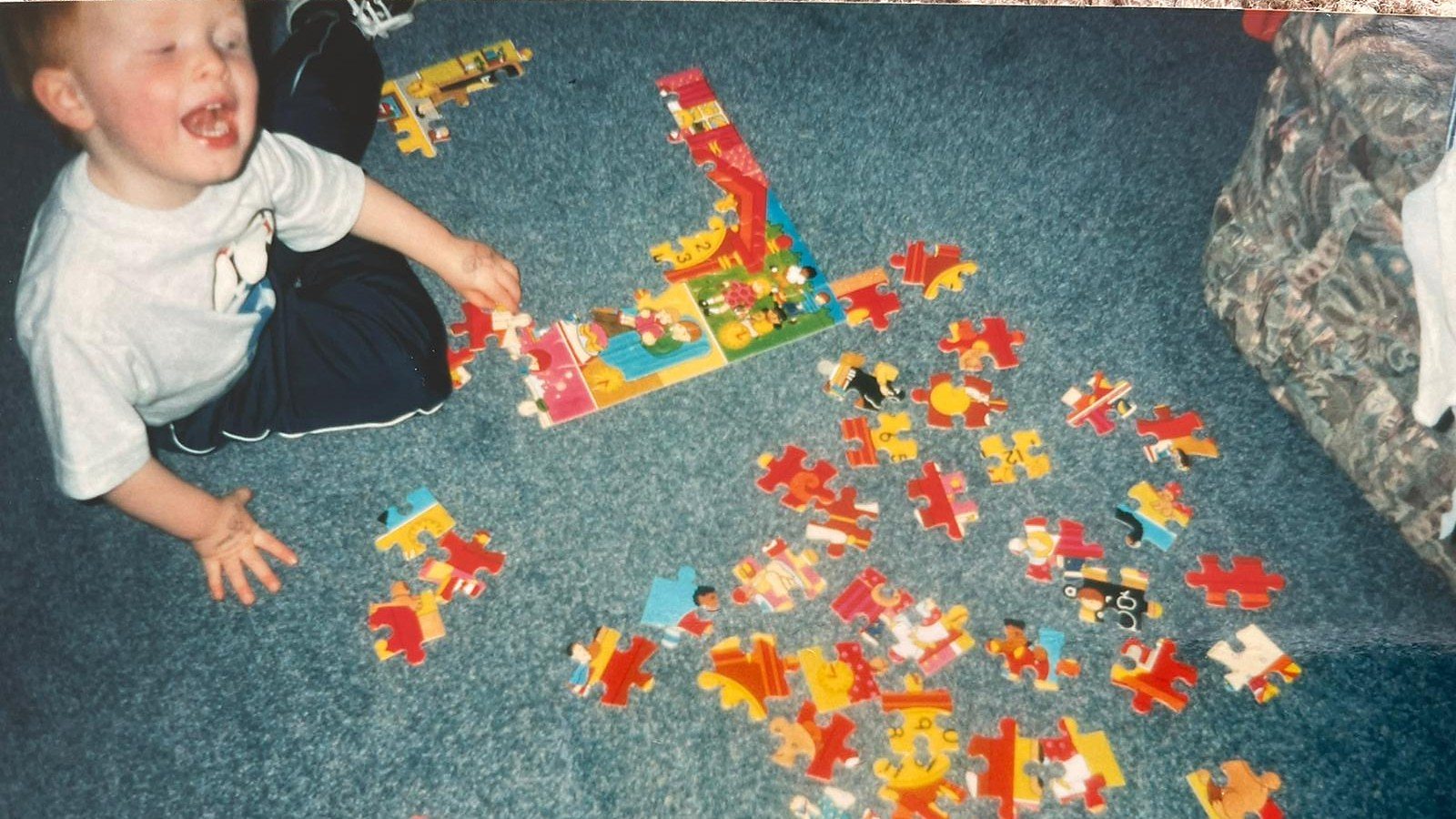 Baby Ash with puzzle