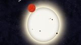 Amateurs discover a planet with four suns, while professionals discover the nearest - just 4 light years away.