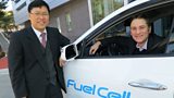 Dr Byung Ki Ahn with Gareth and the hydrogen fuel cell SUV