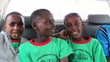 Excited boys travelling home