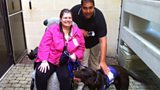 Martin with Alex and Watson the dog talking about Canine Partners