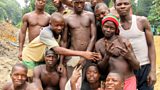 Liberian diamond miners near their excavations along the Moro River