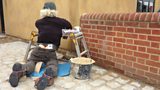 A cheeky builder hard at work