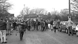Crowds including Arthur Scargill gather outside Parkside Colliery