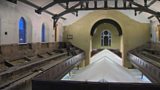 The church where worshippers pray in an indoor tent