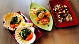 Scallops baked in the shell with dulse parsley and lemon butter