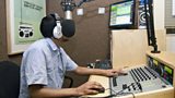 A prisoner recording a radio programme inside HMP Brixton.