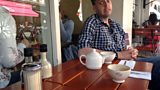 Is there anything wrong with the way Iain is sitting?