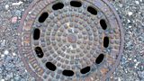 K枚nigsberg manhole cover in Kaliningrad