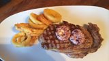 Steak with Red Wine Peppercorn Butter and Buttermilk Onion Rings