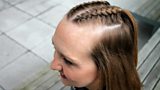 Reporter Sam Fenwick shows off her new braids