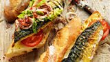Rick Stein's Griddled Mackerel in a baguette with tomato, lettuce, onion, chilli and sumac
