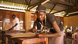 A young woman on a vocational training course provided by the Patongo Youth Centre