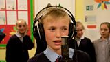 Tracey's son, Henry, singing Mr. Blue Sky (all school pictures by JDA media)