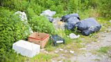 What should you do if you see someone fly tipping?