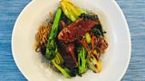 Spiced-roast duck breast with pak choi, ginger, chilli, garlic and dressed noodles