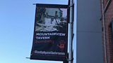 More controversy for a mixed housing estate in east Belfast as banners depicting IRA atrocities erected on lampposts