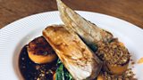 Pork tenderloin with cavolo nero, butternut squash fondant and a crackling and hazelnut crumb