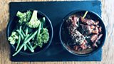 Lamb meatballs in a red wine sauce and garlic green beans and brocolli