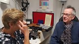 John Hegley with Linda Lucas, optometrist and volunteer