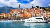 A luxury yacht docks on the coast of the South of France (Credit: Alamy)