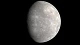 A black-and-white image of Mercury partly in shadow captured by the Messenger spacecraft (Credit: Nasa)