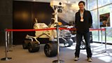 Kevin Fong next to replica of the Curiosity Mars Rover