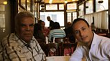Author, Ibrahim Abdel Meguid stops for a coffee with Tarek Osman in Café Riche