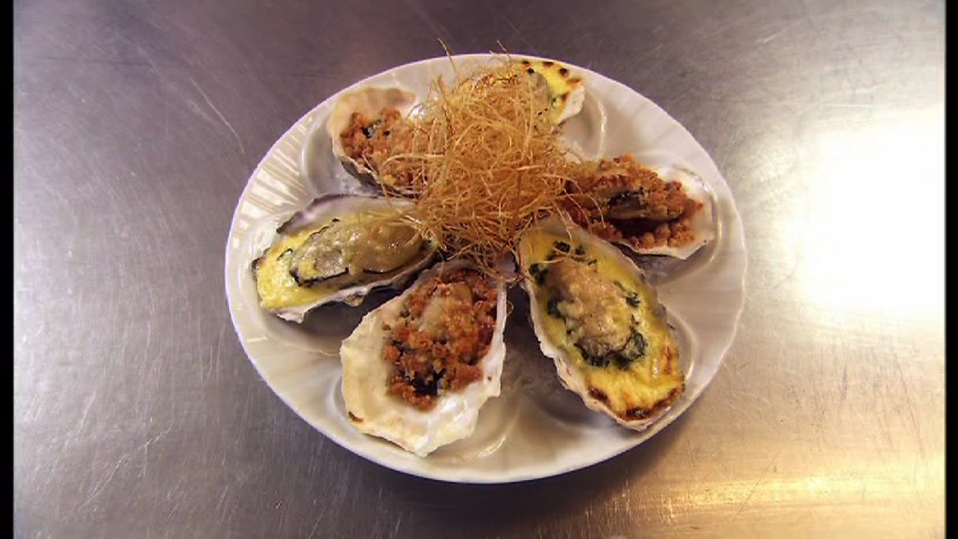 BBC BBC Food, How to cook Oysters Rockefeller and Oysters Kilpatrick.