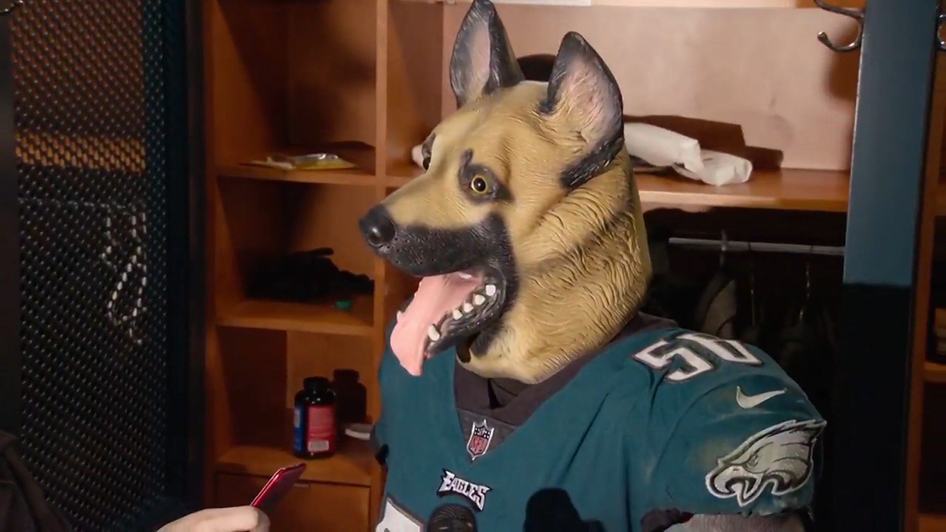 LOOK: Chris Long barks at fans and breaks out the dog mask to celebrate  Eagles win 