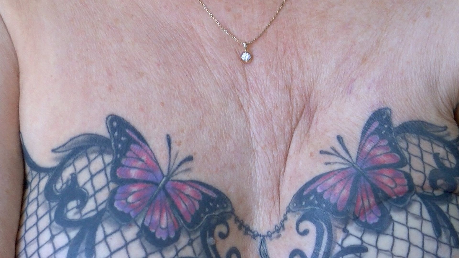 Bra tattoo changed woman's life after breast cancer - BBC News