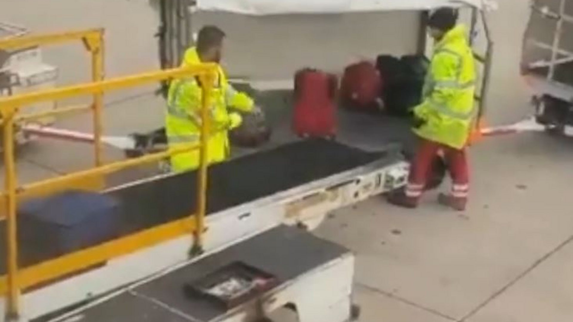 pray Creed lonely Manchester Airport baggage handler filmed lobbing luggage - BBC News