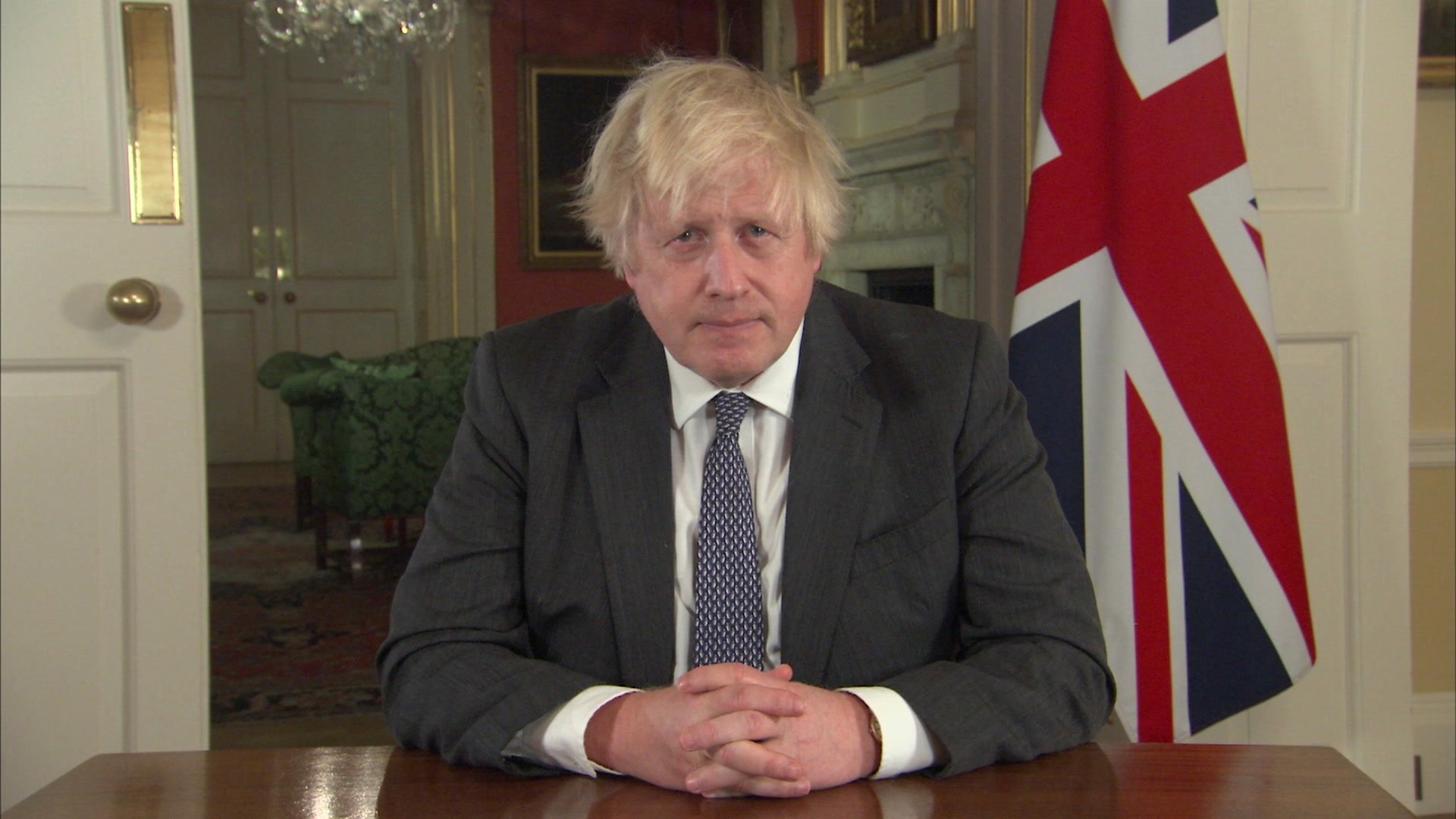 Covid: Boris Johnson sets new booster target over 'Omicron tidal wave'