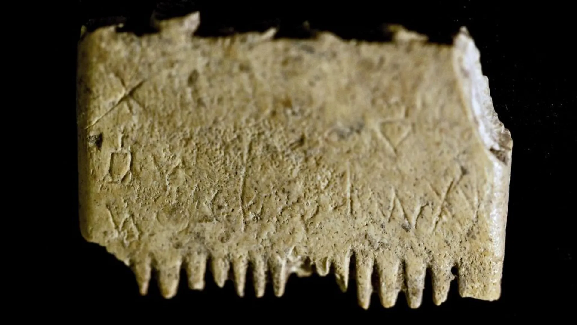 Decoding oldest known sentence written in first alphabet