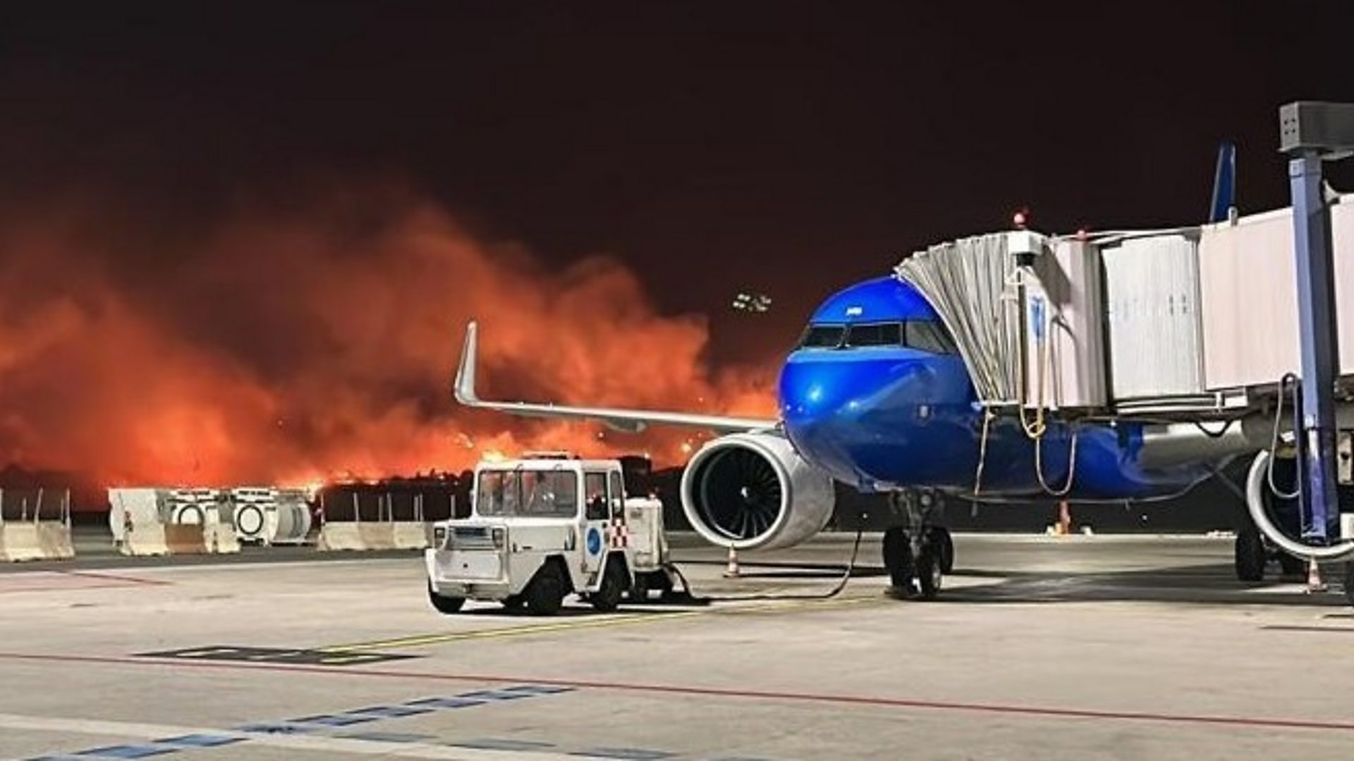 Watch Raging wildfires shut down Italian airport