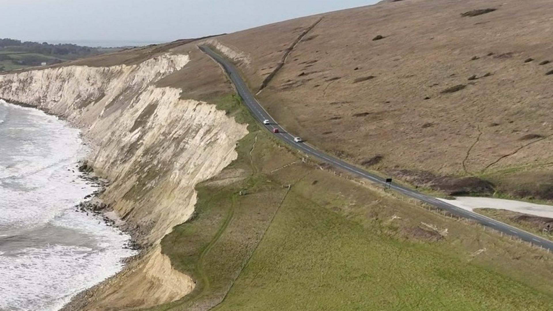 Drone video shows scenic island road just metres from collapse