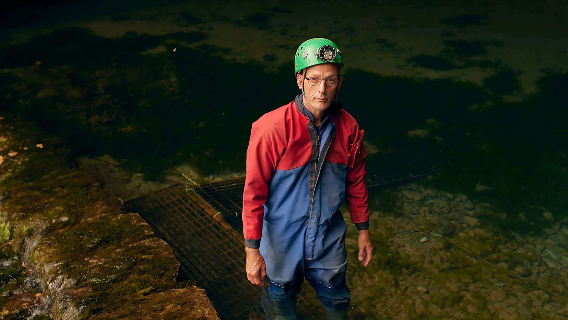 BBC Journalist, Katherine Latham, interviews caver, Phil Short, in Wookey Hole Cave (Credit: Fran Gomez de Villaboa)