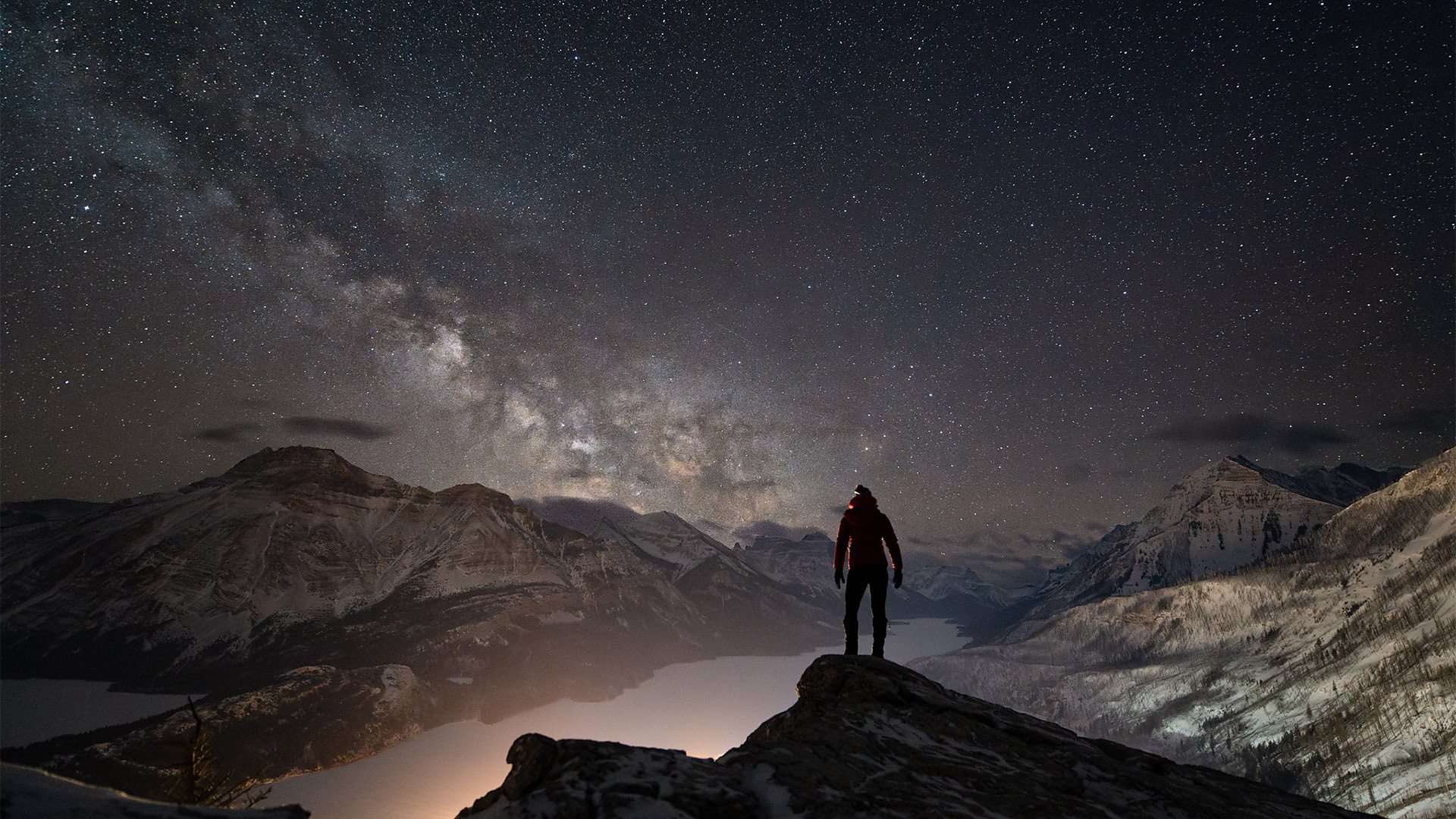 Monika Deviat's self portrait with the rising Milky Way on a mountain ridge in Waterton Lakes National Park, an international Dark Sky Park in Alberta, Canada (Credit: Monika Deviat Photography)