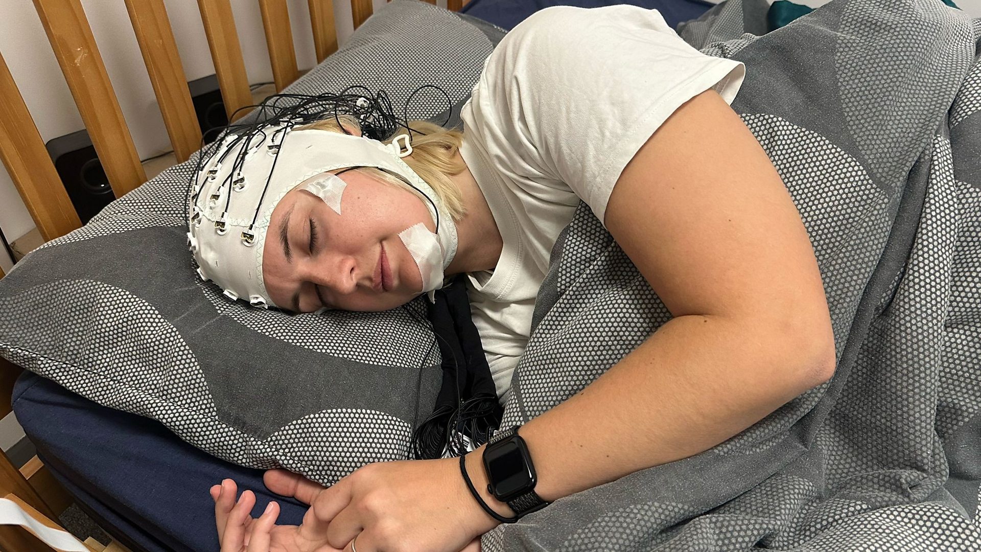 Caroline Steel takes a nap in Cardiff University’s sleep lab (Credit: BBC)