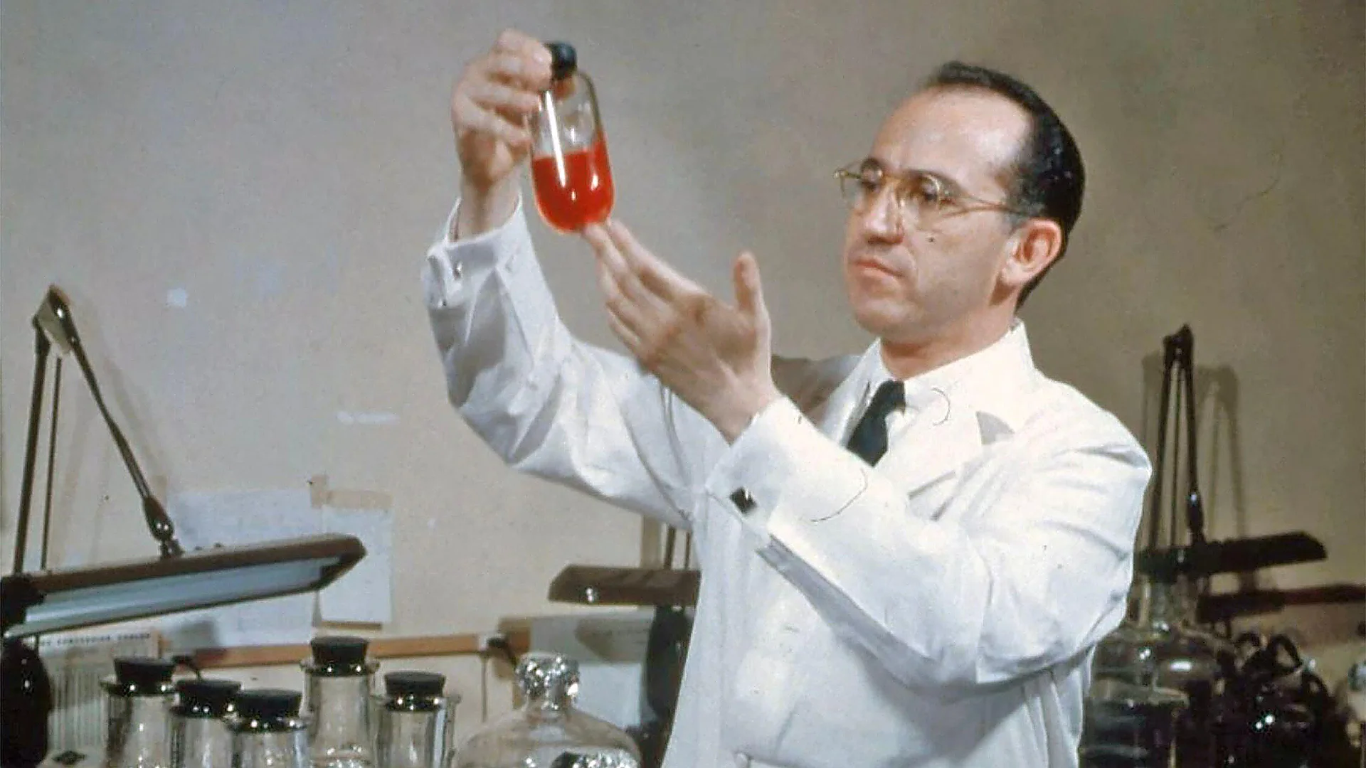 Portrait of Dr Jonas Salk in a laboratory coat