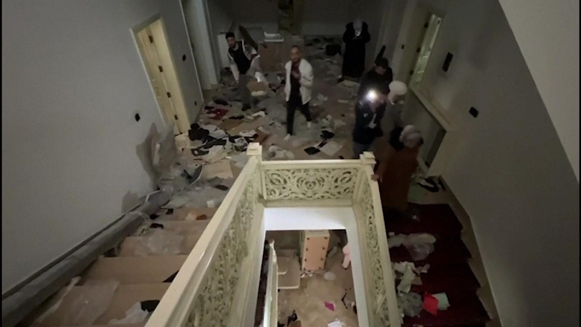 Video shows Bashar al Assad residence stormed
