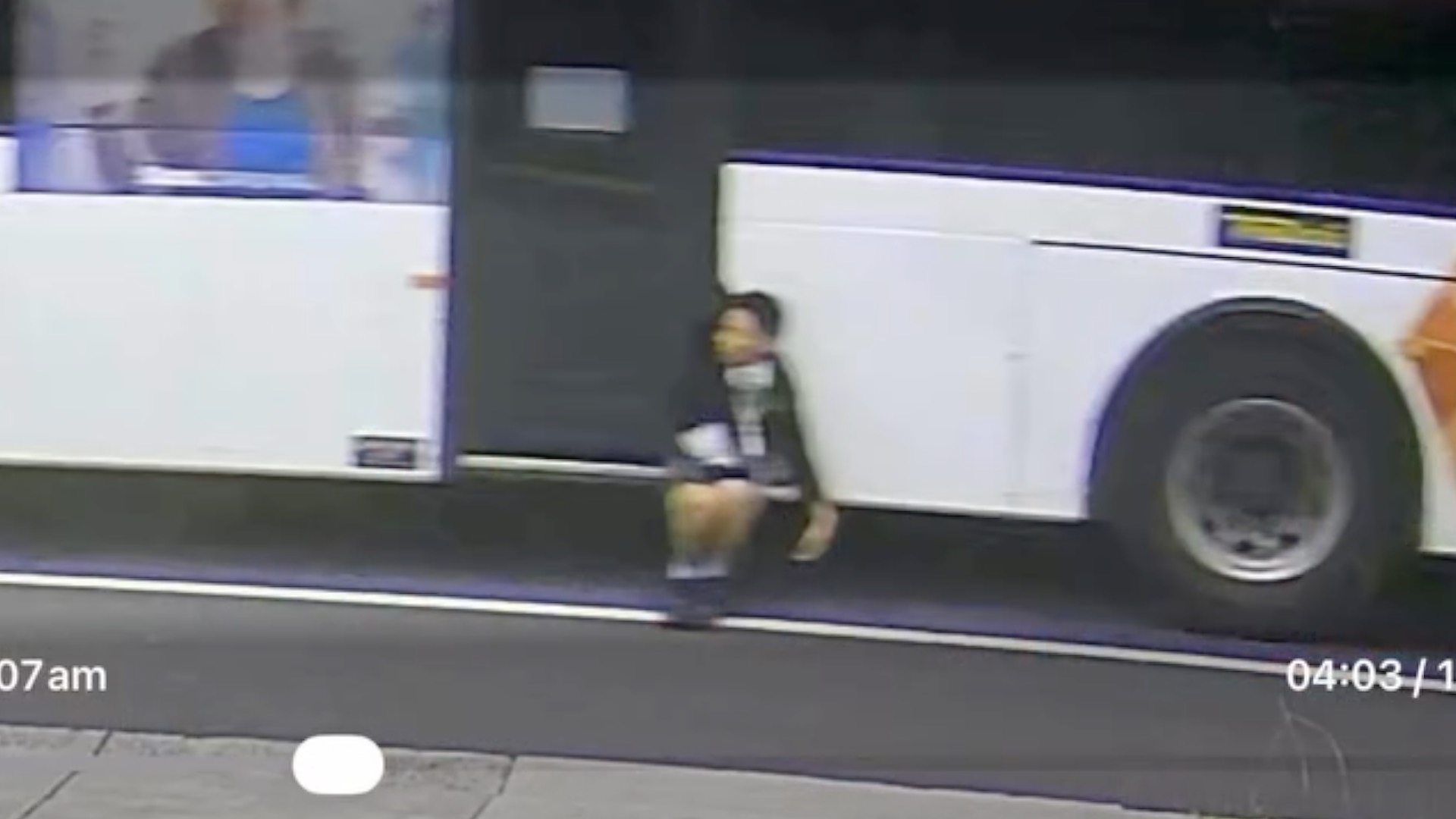 Watch: Trapped boy dangles from moving bus in Australia