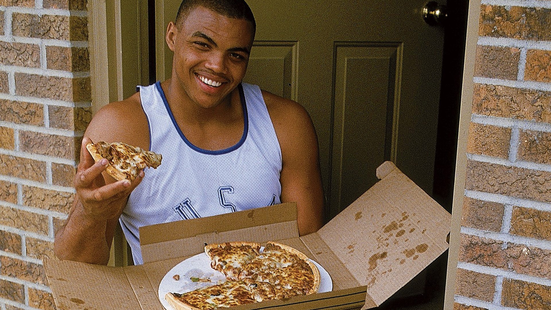Charles barkley eats pizza