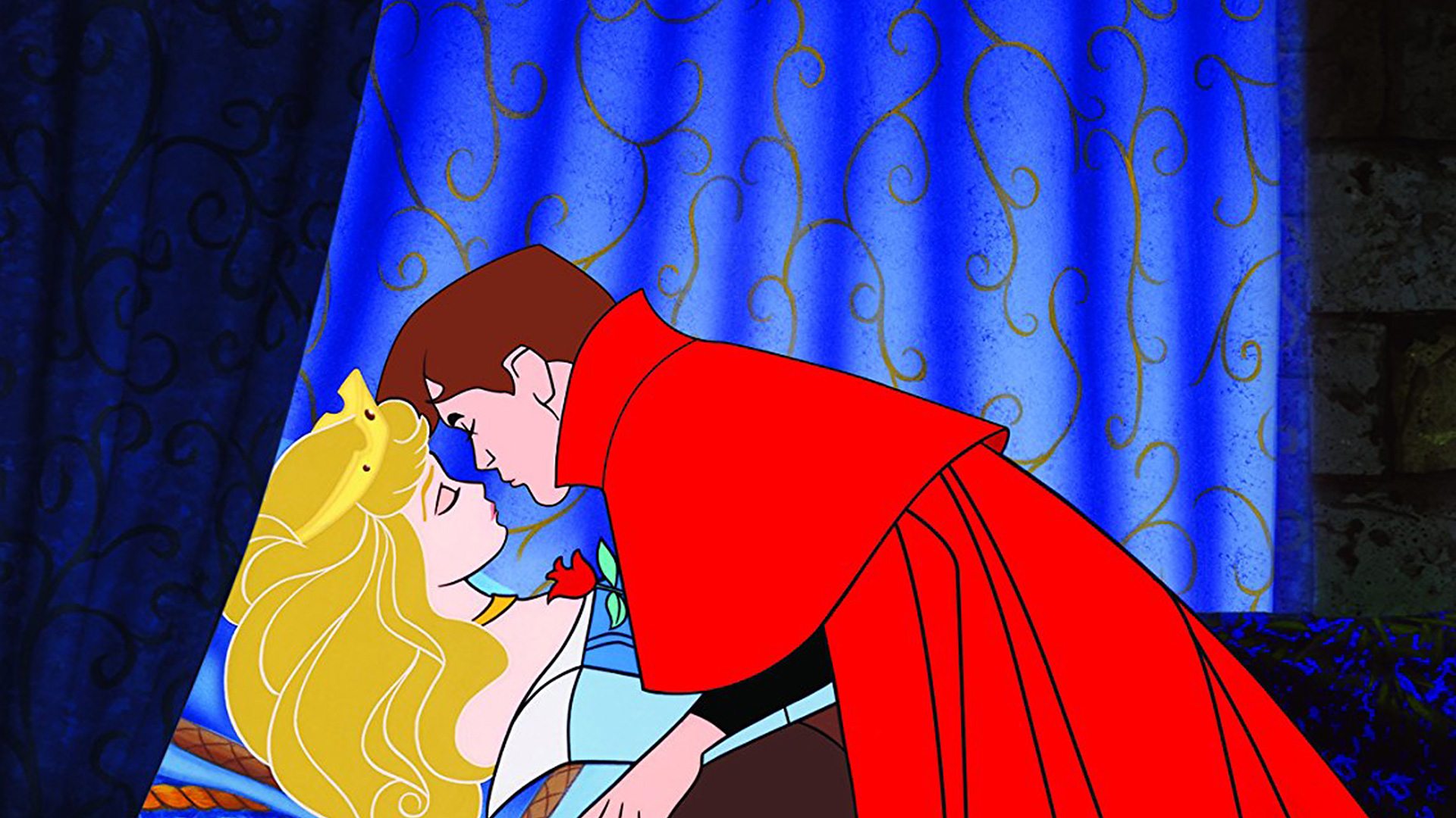 A still of Walt Disney's Sleeping Beauty showing the prince kissing the sleeping princess