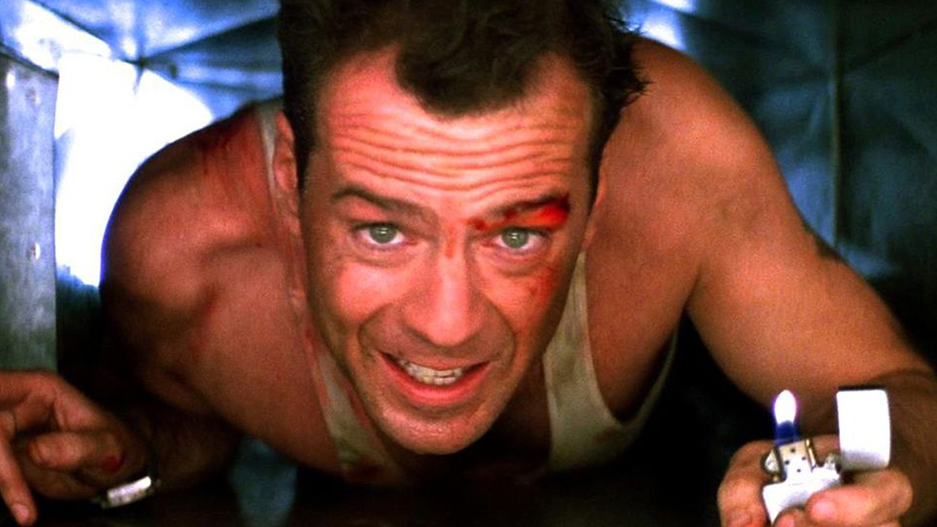 Bruce Willis in an air vent as John McClane in Die Hard