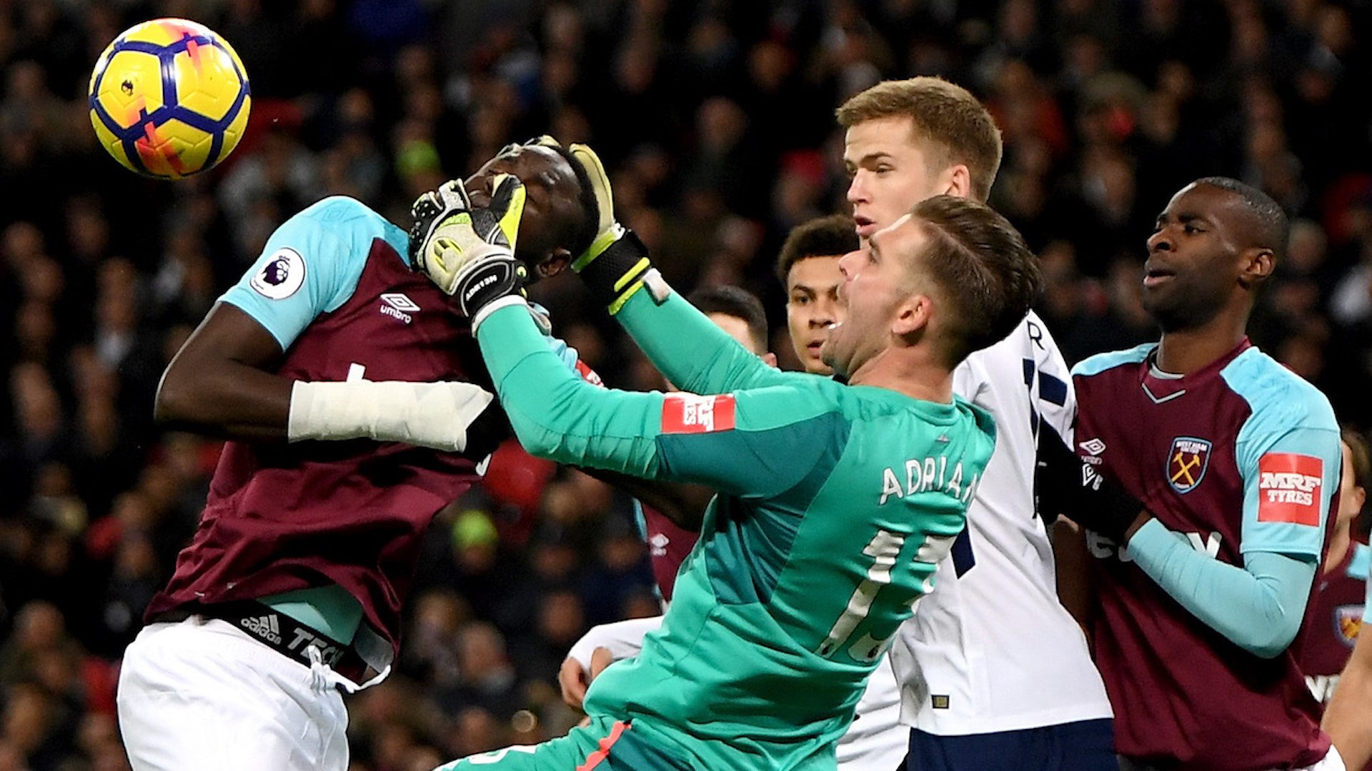 West Ham's Adrian grabs team-mate Cheikhou Kouyate