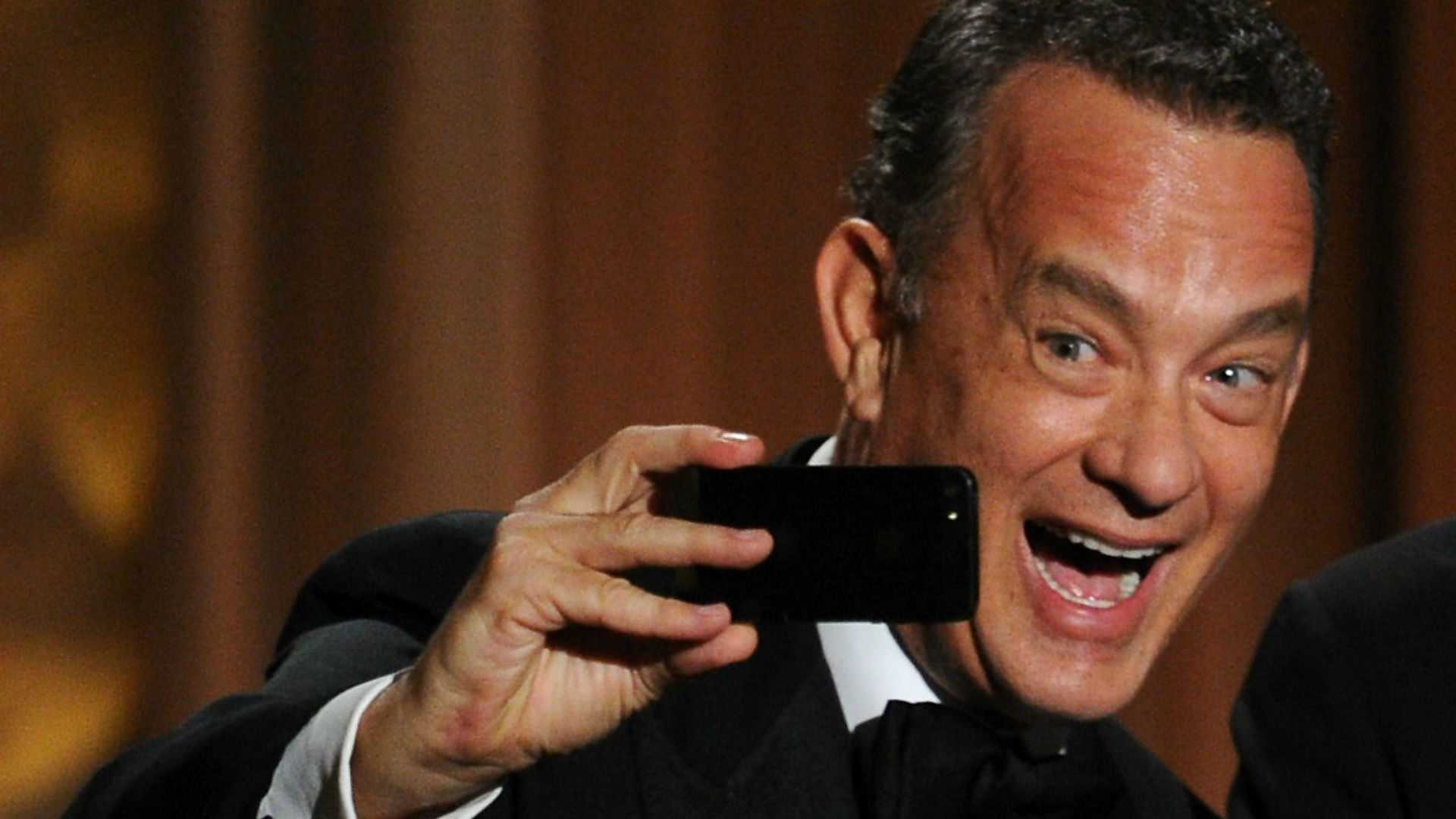 Tom Hanks taking a selfie