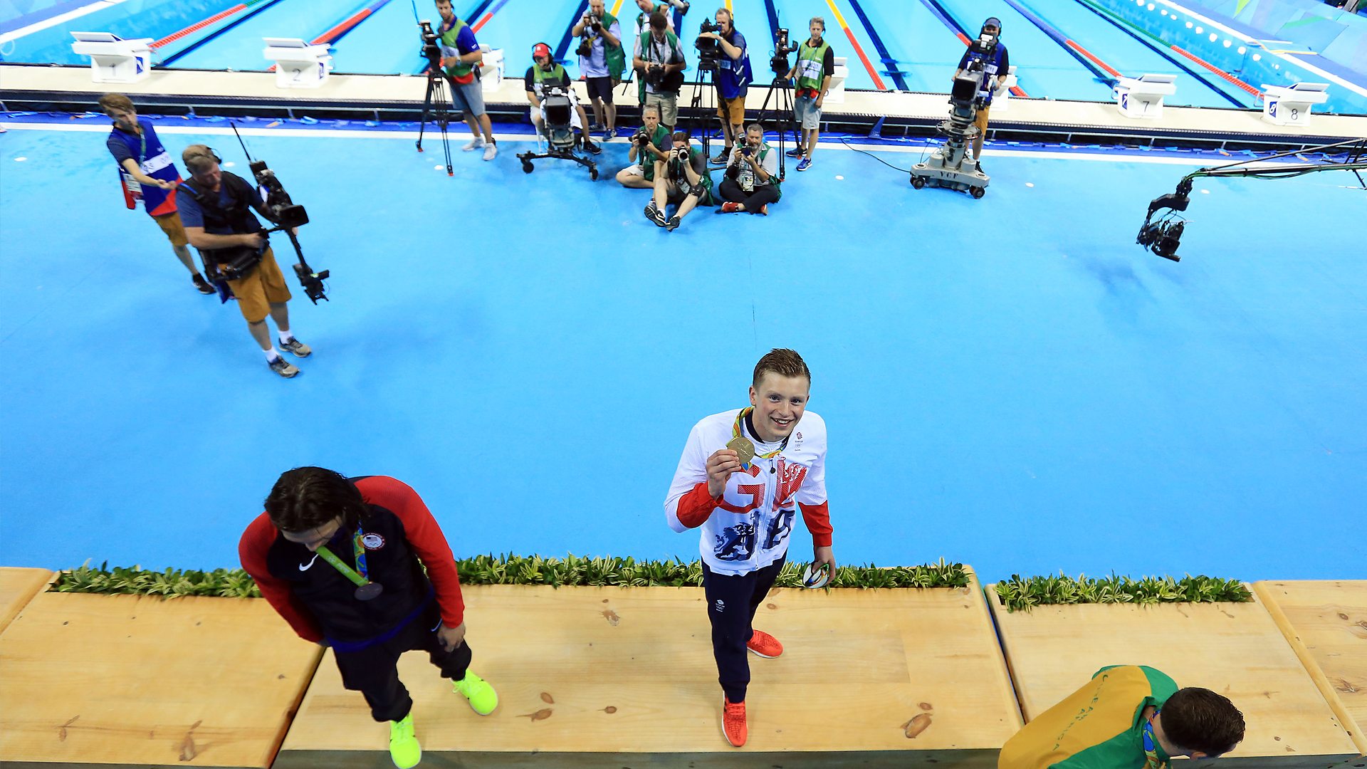 Adam peaty celebrates gold